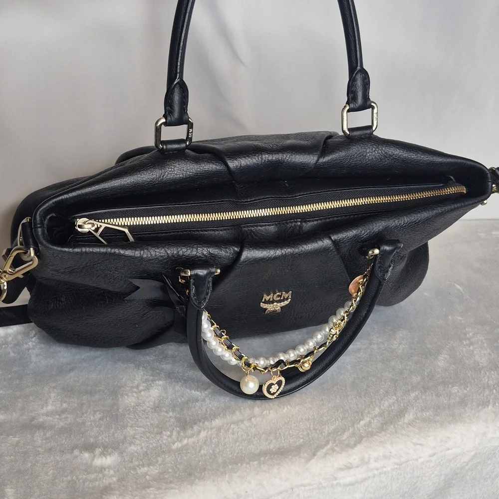 MCM Black Leather Handbag with Gold Accents